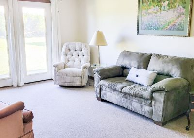 Comfort sitting room in personalized apartments for seniors.